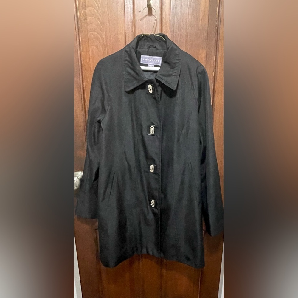 Laura Scott womenβs size XL black trench Raincoat with twist lock fasteners.